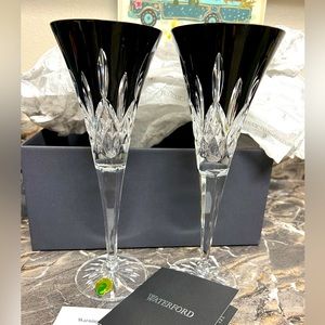 Pair of black Waterford Lismore flutes